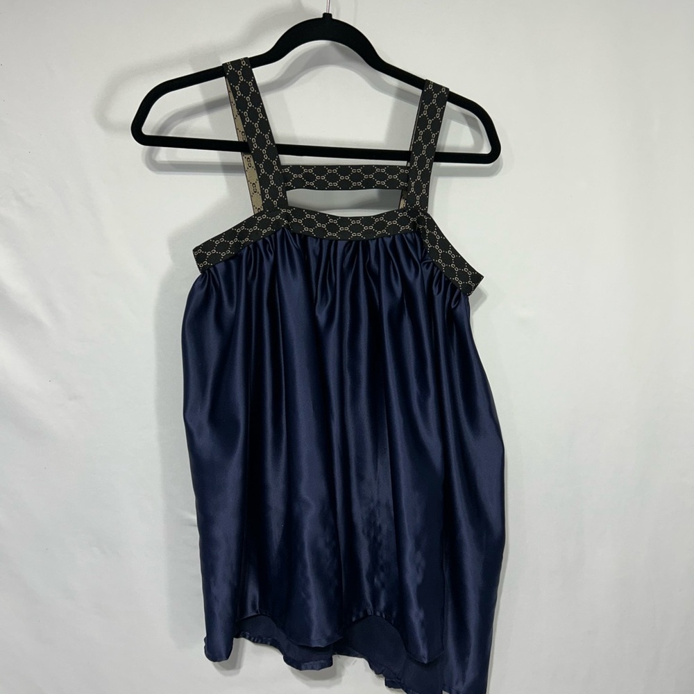 Navy Satin Sleeveless top with Patterned elastic Straps. Size large.
